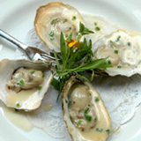 Grilled oysters with champagne beurre blanc